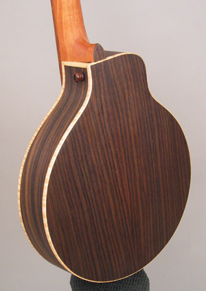 Photo showing a close view of the curly maple binding