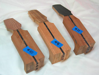 Necks for Mandonators 9, 10, and 11 prior to the fingerboard
