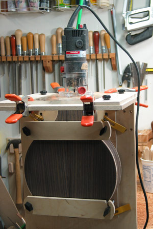Photo of instrument body in mortise cutting jig