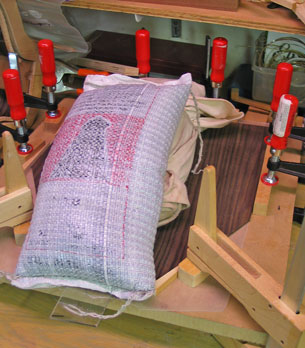 Photo showing the two halves of the back of Mandonator 14 being joined together