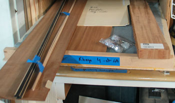 Photo of the wood for Mandonator 18 gathered on a storage drawer