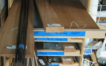 Photo of the wood for Mandonator 19 gathered on a storage drawer