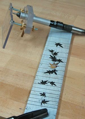 Picture of the fingerboard inlay in progress on Mandonator 9